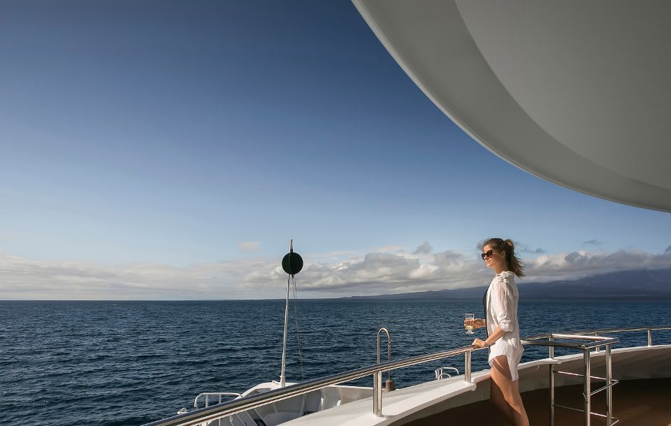 Guest Enjoying The View Aboard Galapagos Cruise.