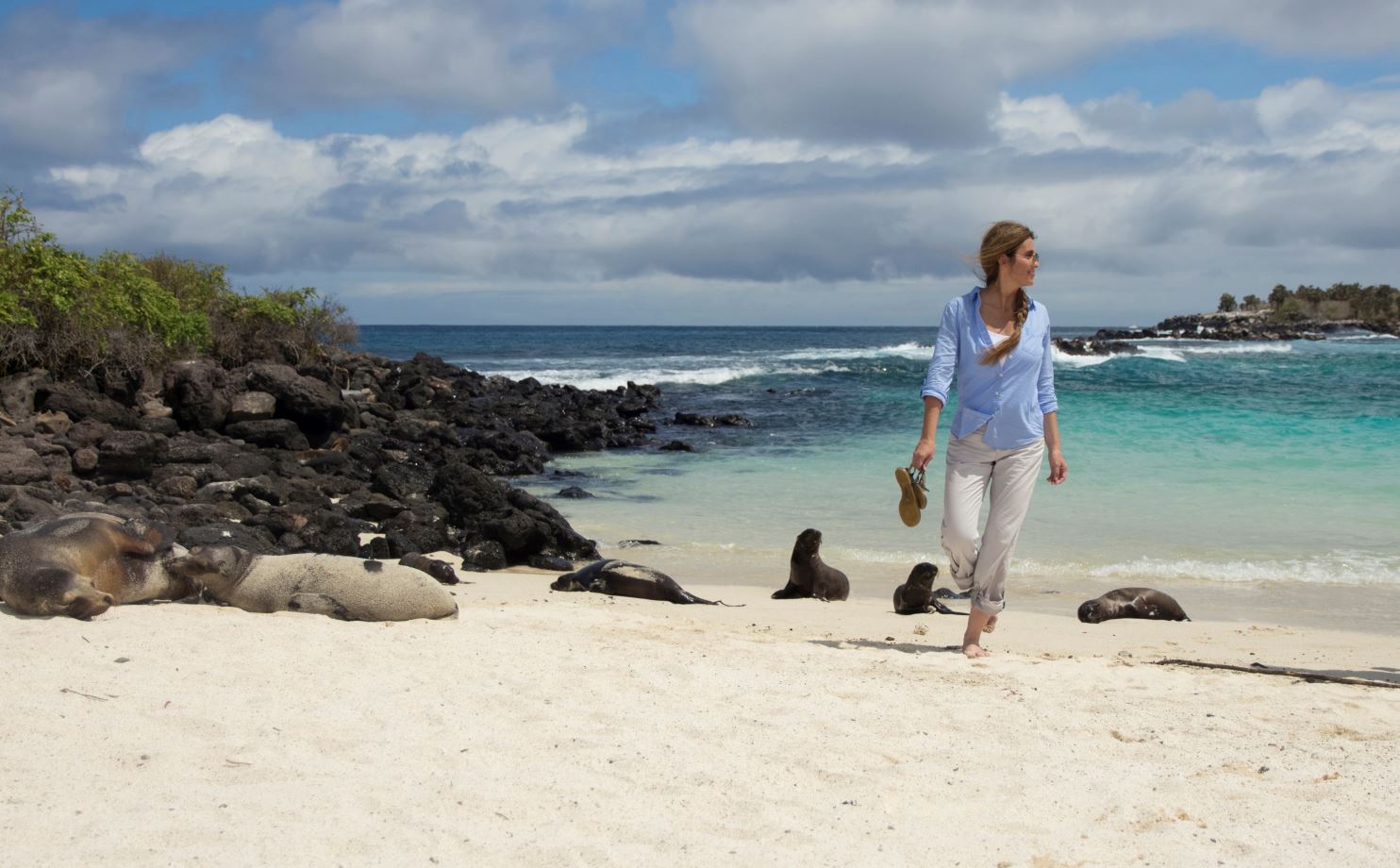 Woman On A Beach In The Galapagos Islands