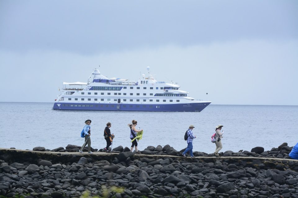 Santa Cruz's Guests Walking Through A Trail At Española Island