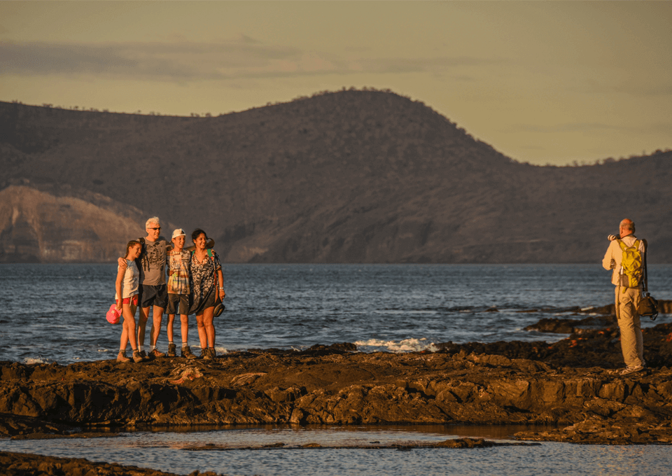 Family Enjoying A Vacation In The Galapagos Islands