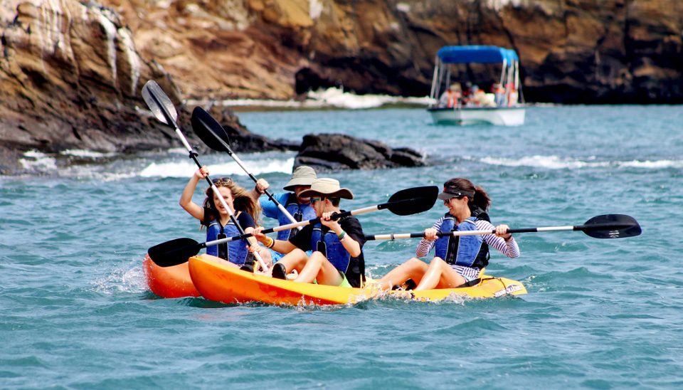 Simultaneous Activities Aboard Santa Cruz Ii Galapagos Cruise.