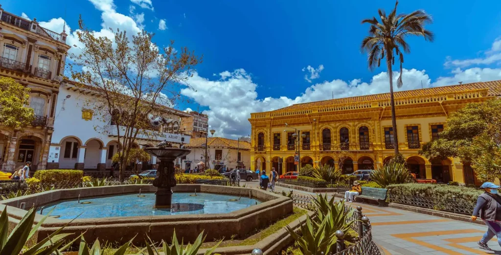 Fountain and colonial buildings at Parque Calderon in Cuenca