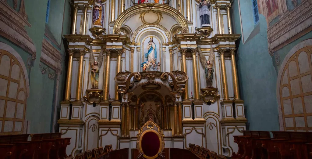 Baroque gold altarpiece inside the Old Cathedral of Cuenca