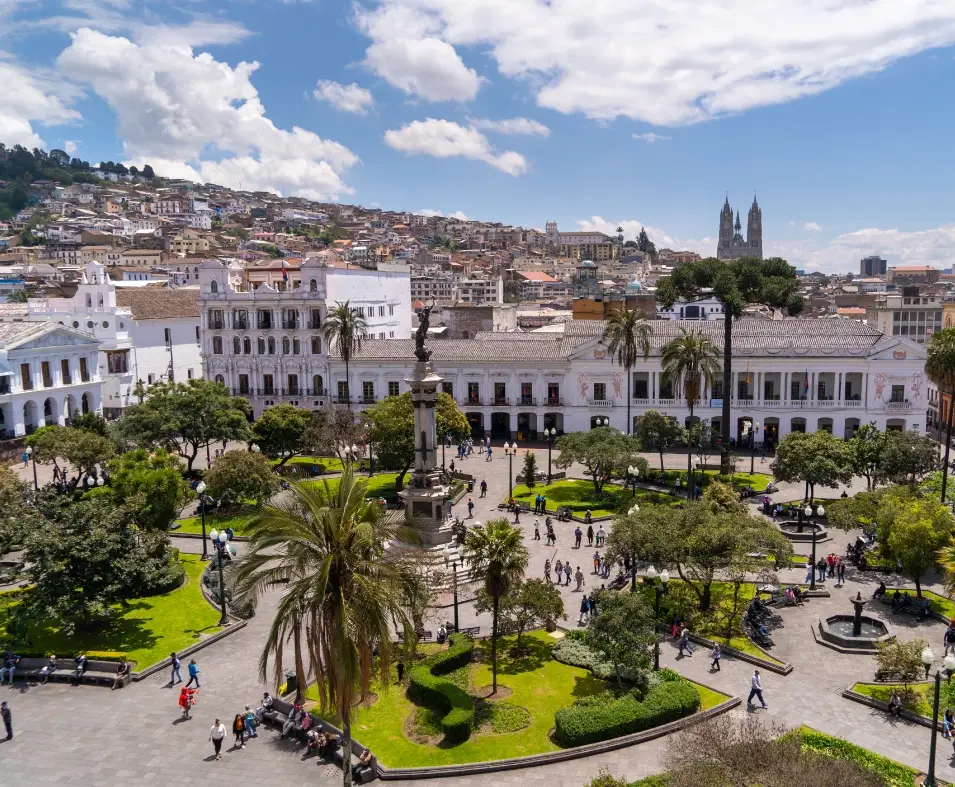 Plaza Grande In Quito’s Historic Center With The Independence Monument, Colonial Buildings, And Visitors In The Main Square. Plaza Grande In Quito’s Historic Center With The Independence Monument, Colonial Buildings, And Visitors In The Main Square.
