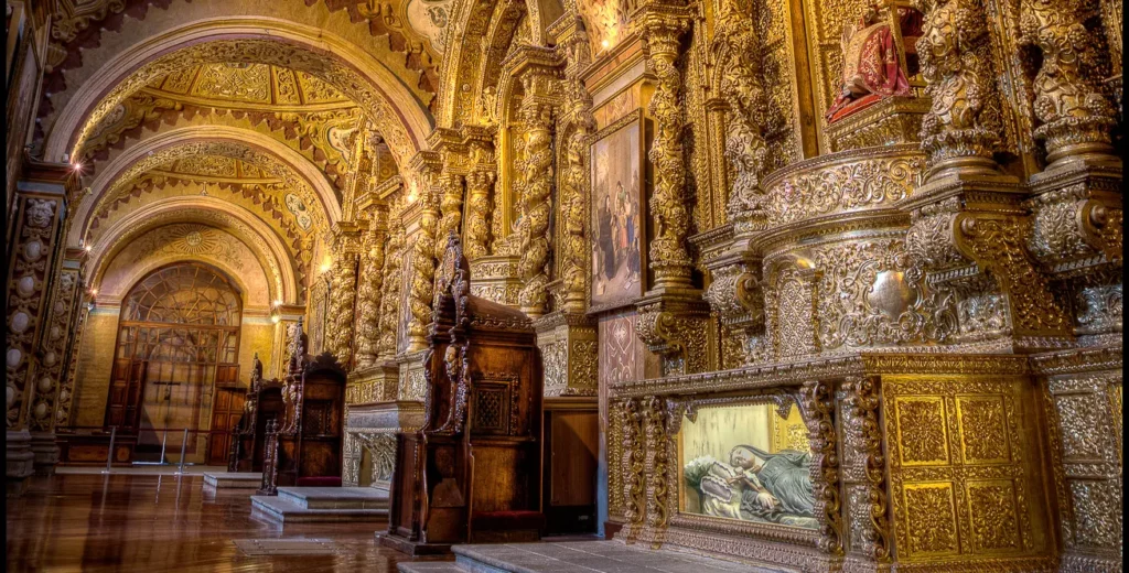 Gold-leaf nave and altars inside La Compania de Jesus church