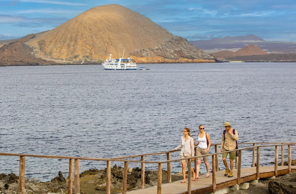 Visitors hiking the boardwalk to Bartolome Island viewpoint, Galapagos