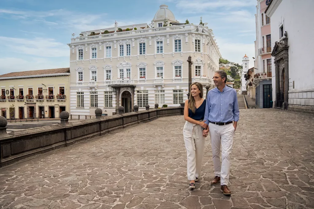 Couple walking near Casa Gangotena in Quito's Historic Center