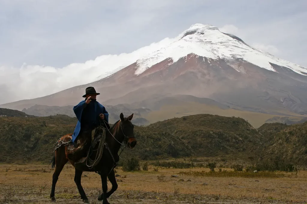 Close up view of the snow capped Cotopaxi volcano peak