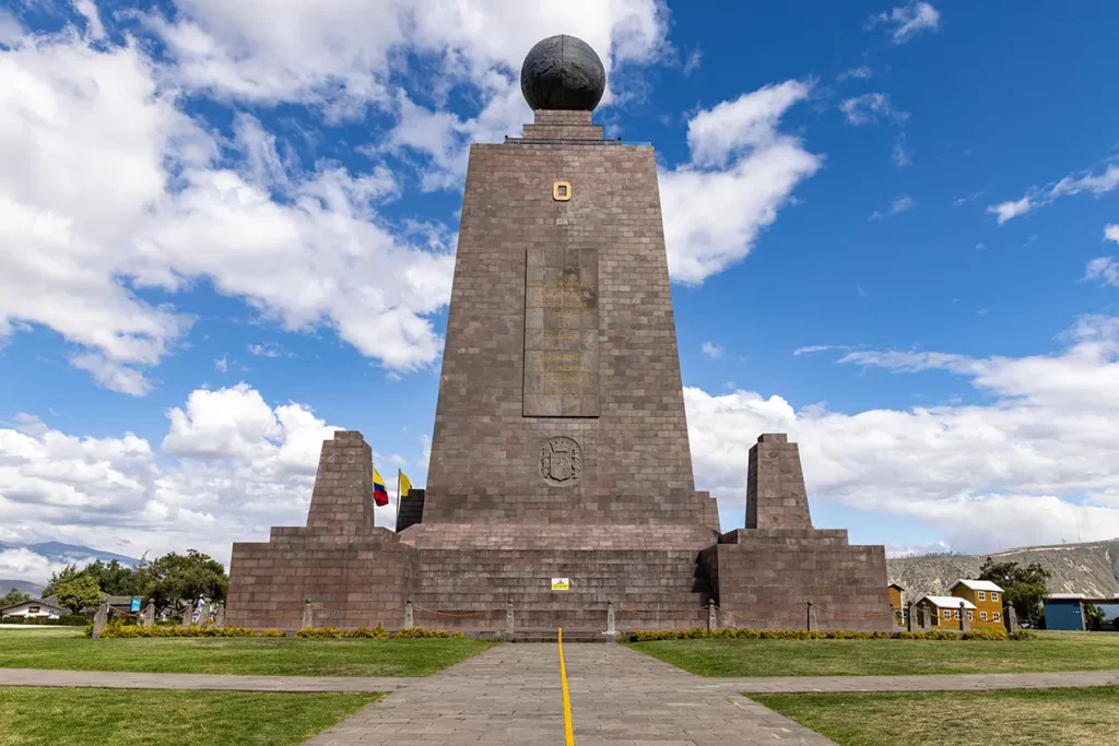 Front view of the Mitad del Mundo monument with the equator line