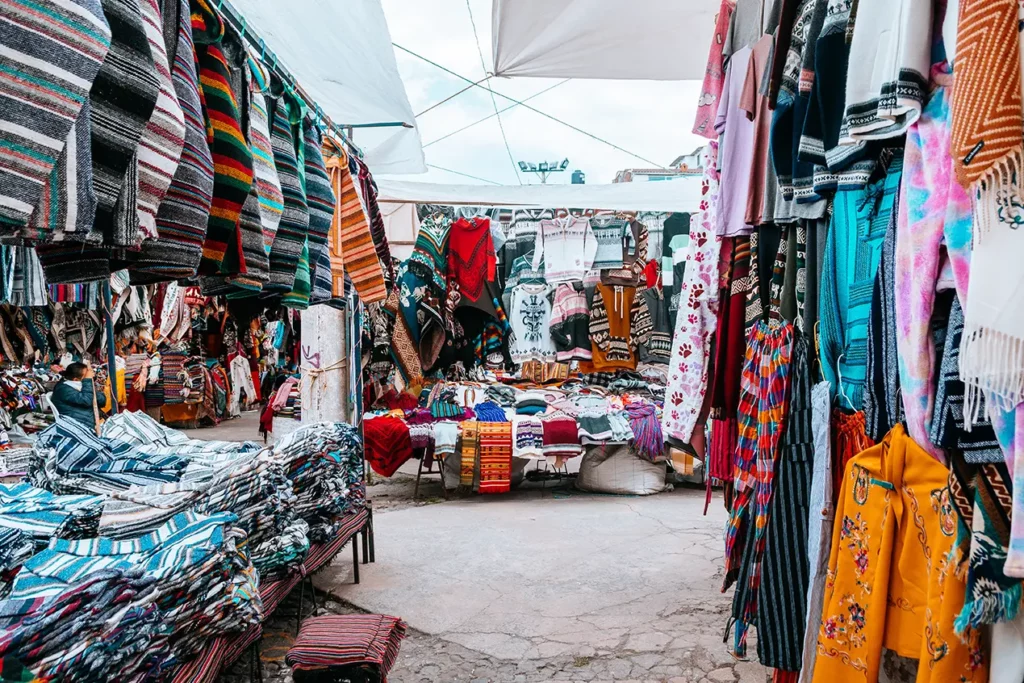 Colorful ponchos and textiles for sale at the Otavalo Ponchos Market