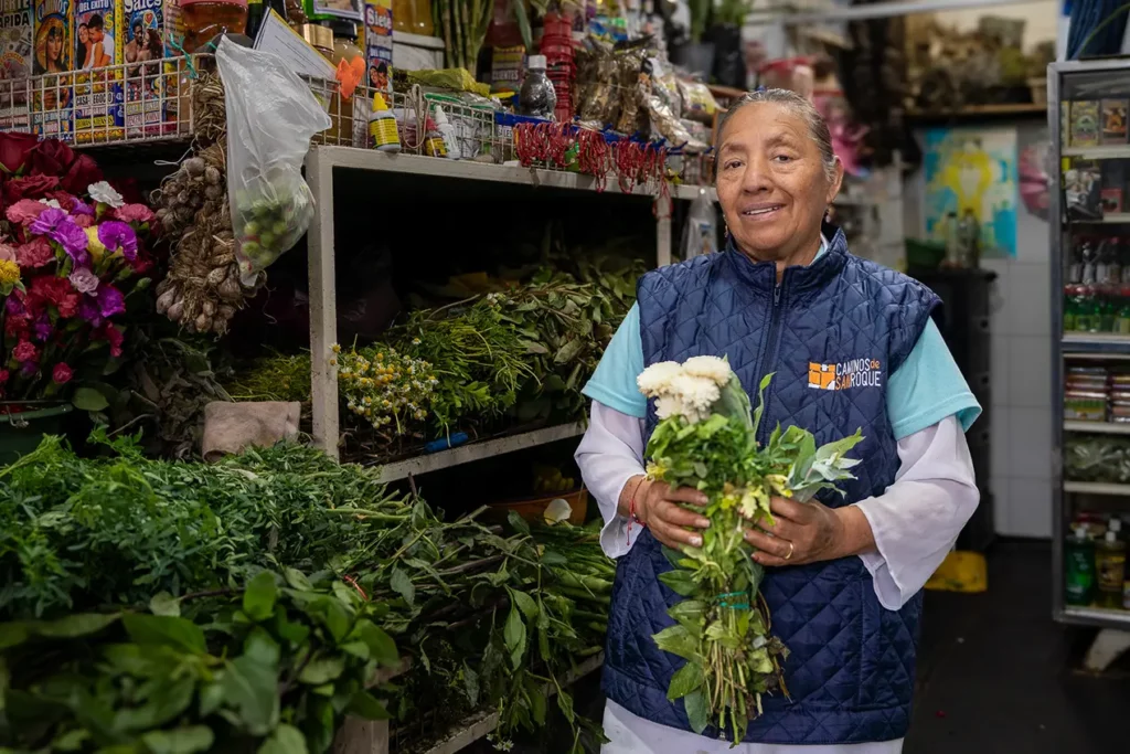 Vendor stall with fresh produce at a traditional market in Quito
